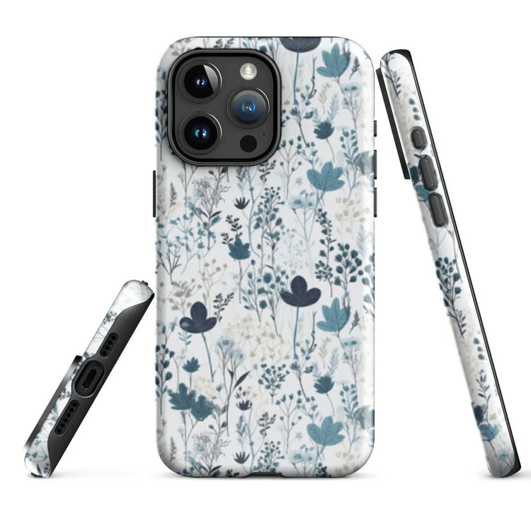 Image of an iPhone 15 Pro Max feature a phone case with winy blue florals on top of a white background.