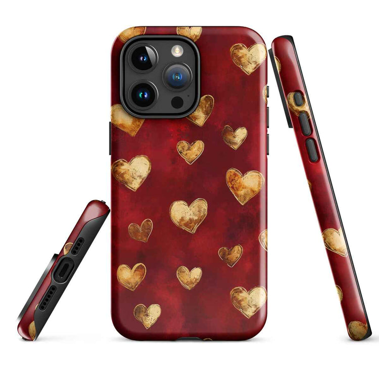 an iPhone 15 Case featuring golden love hearts across a deep red background by pattern symphony.